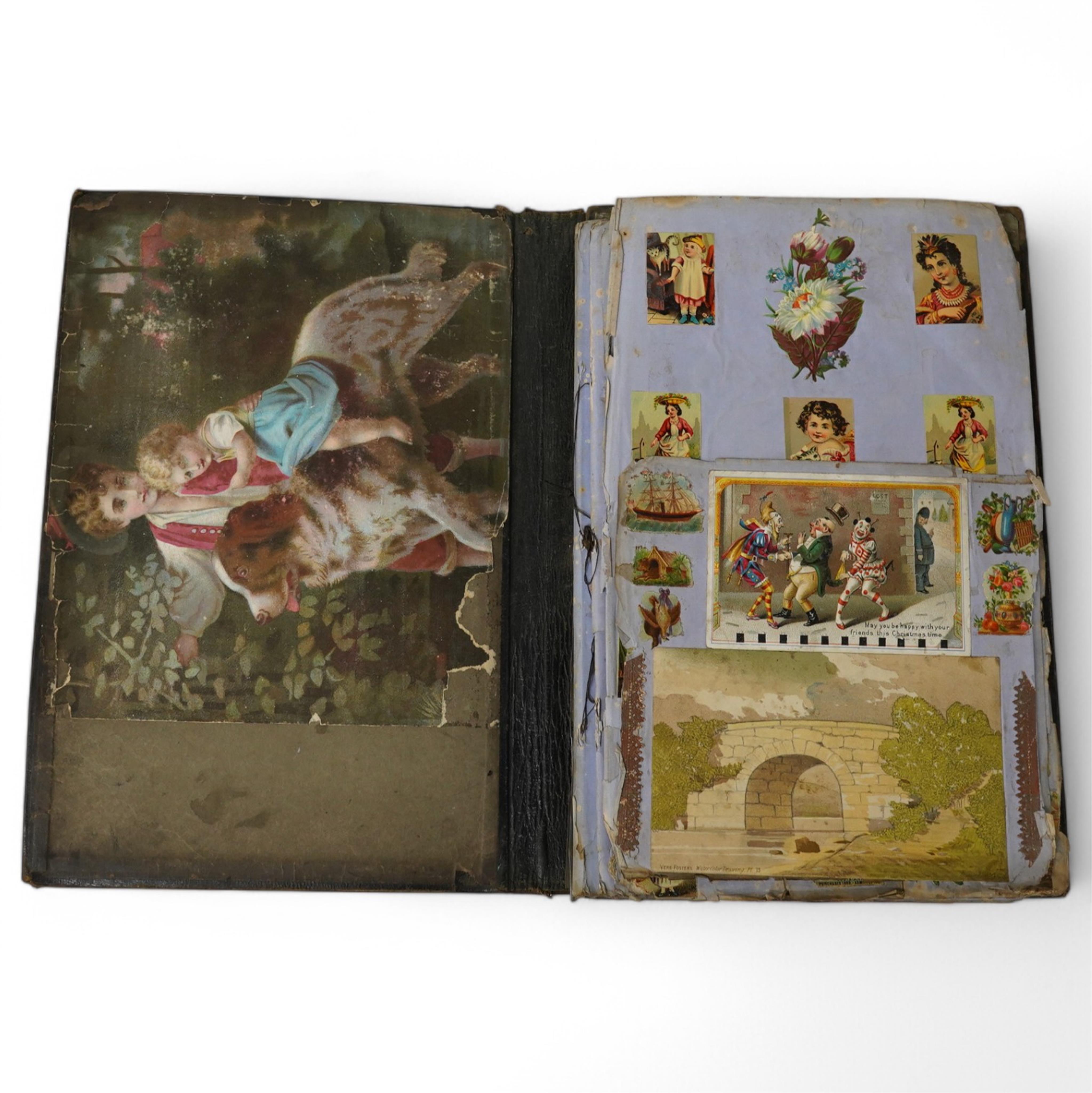 A 19th century/ early 20th century scrap book. Condition - scraps in good condition, album worn